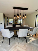 Eetkamerstoel Ivy in off‑white Aquaclean stof met zwarte poten