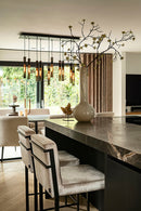 Barstoel Jill in zilverkleurige stof met zwart metalen frame