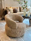 Draaifauteuil Joelia in zachte lichtbruine 'schapen' stof