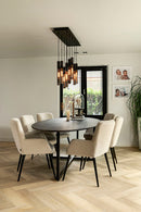 Eetkamerstoel Ivy in off‑white Aquaclean stof met zwarte poten