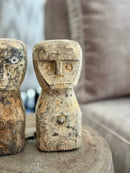 Houten geluksbeeldje met getuite lipjes