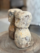 Houten geluksbeeldje met getuite lipjes