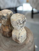Houten geluksbeeldje met getuite lipjes