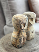 Houten geluksbeeldje met getuite lipjes