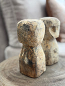 Houten geluksbeeldje met getuite lipjes