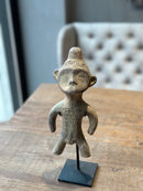 Stenen mannetje op statief