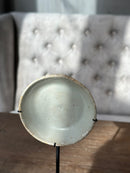 Oud bordje op statief