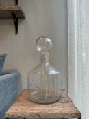 Glazen fles met ronde dop