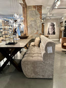 Eetkamerbank Loa in in grove beigekleurige stof met geblokte zitting - 250 cm