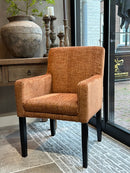 Eetkamerstoel Torino in roestbruine gewolkte stof met handvat