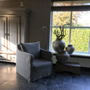 Fauteuil Silke in een lichtgrijze katoen-linnen stof