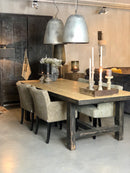 Eettafel Ben van oud hout met zwarte rand en zwarte H-poot