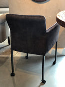 Eetkamerstoel Randy in antracietgrijze/bruine velours stof met parketwielen