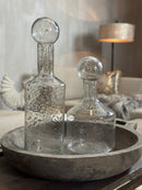 Glazen fles met ronde dop