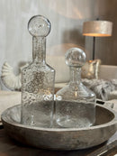 Glazen fles met ronde dop