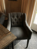 Eetkamerstoel Katja in grijze linnen-katoen stof met gecapitonneerde rugleuning